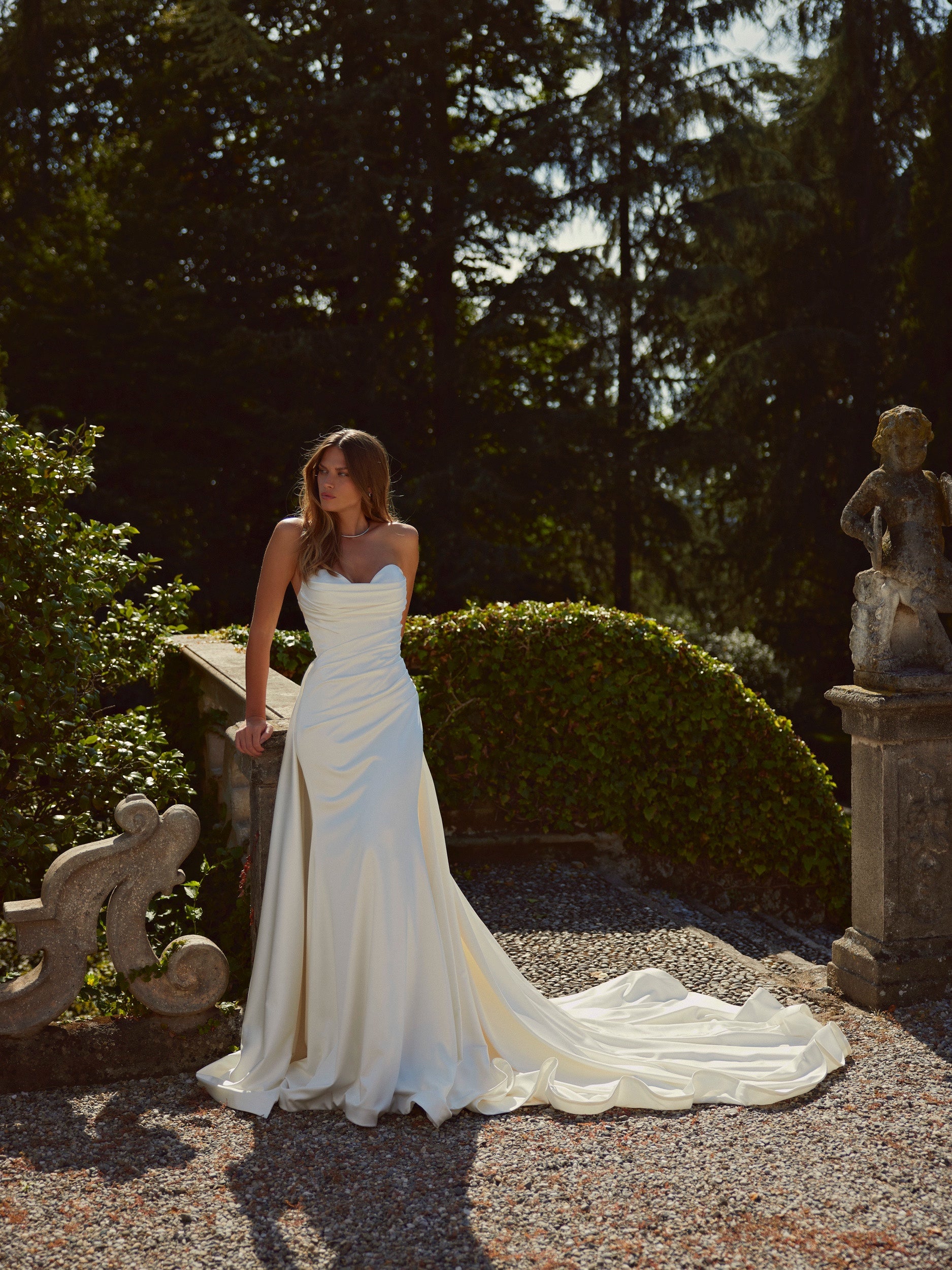 Alma - Strapless Ruched Detailing Italian Satin Fit-and-flare Style Wedding Dress With Detachable Overskirt | Full Moon Bridal Couture Alma - Strapless Ruched Detailing Italian Satin Fit-and-flare Style Wedding Dress With Detachable Overskirt | Full Moon Bridal Couture